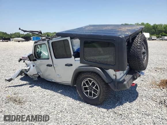 2024 Jeep Wrangler Rubicon with VIN 1C4PJXFG6RW263774, listed as a Copart auction lot 57766925 with 19,429 mi miles and Non repairable. Bid and sale history available at DreamBid. Image 2.