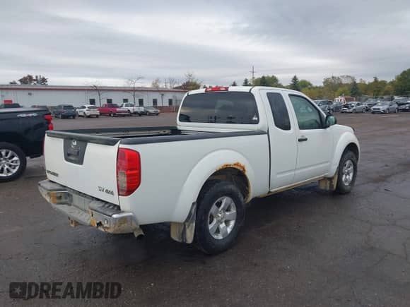 2013 Nissan Frontier SV with VIN 1N6AD0CW9DN747921, listed as a IAAI auction lot 43463501 with 206,406 mi miles and . Bid and sale history available at DreamBid. Image 4.