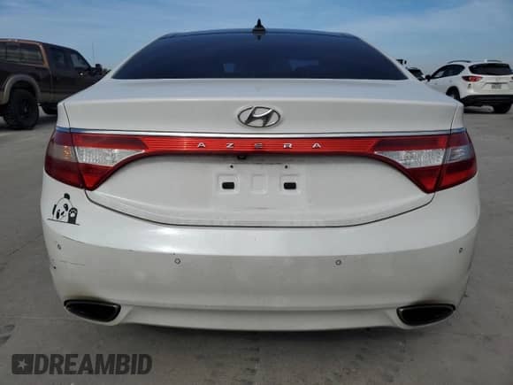 2013 Hyundai Azera with VIN KMHFH4JGXDA245793, listed as a Copart auction lot 82435324 with 144,269 mi miles and Clean title. Bid and sale history available at DreamBid. Image 6.