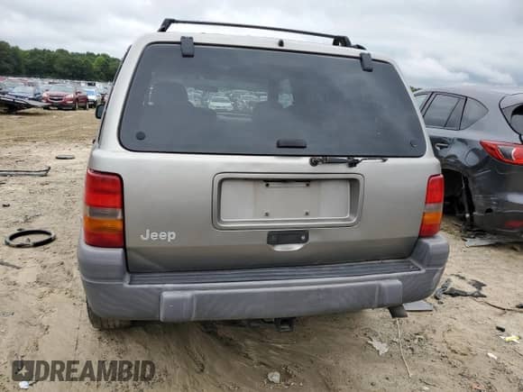 1998 Jeep Grand Cherokee Laredo с VIN 1J4FX58S7WC350624, выставлен на аукционе Copart как лот 63063624 с пробегом Не указан миль и Списание • Salvage title. История ставок и продаж доступна на DreamBid. Изображение 6.