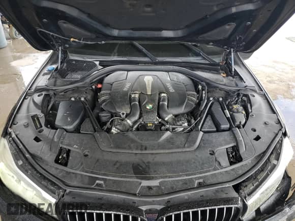 2018 BMW 7 Series 750i with VIN WBA7F0C56JGM22820, listed as a Copart auction lot 84008985 with 82,715 mi miles and Salvage title. Bid and sale history available at DreamBid. Image 11.