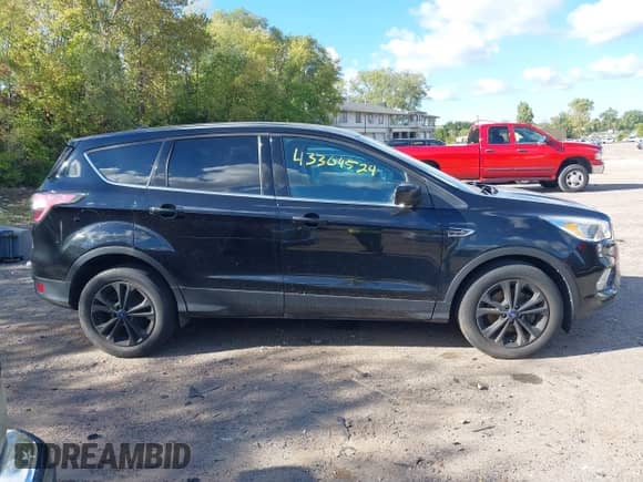 2017 Ford Escape SE with VIN 1FMCU9GD0HUA12356, listed as a IAAI auction lot 43304524 with 104,565 mi miles and . Bid and sale history available at DreamBid. Image 13.