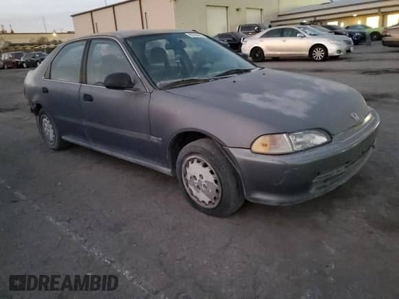 1994 Honda Civic with VIN 1HGEG865XRL041722, listed as a Copart auction lot 82784693 with 173,368 mi miles and Salvage title. Bid and sale history available at DreamBid. Image 4.