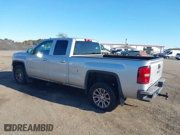 2014 GMC Sierra 1500 SLE with VIN 1GTV2UEC1EZ277382, listed as a IAAI auction lot 43487639 with 152,609 mi miles and . Bid and sale history available at DreamBid. Image 6.