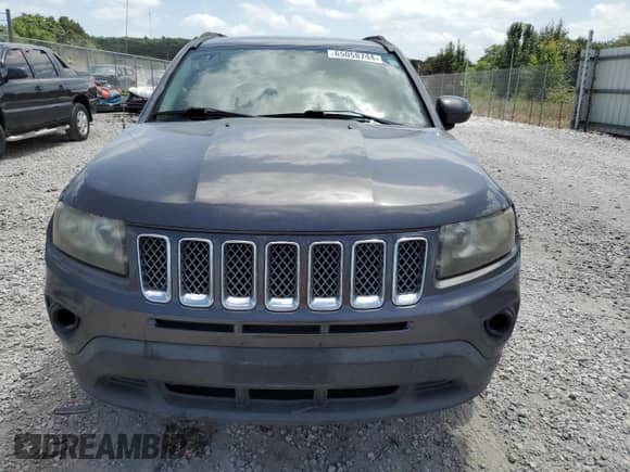 2015 Jeep Compass Latitude with VIN 1C4NJCEB9FD296054, listed as a Copart auction lot 65058744 with 122,604 mi miles and Salvage title. Bid and sale history available at DreamBid. Image 5.