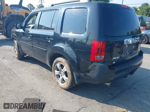 2013 Honda Pilot EX-L with VIN 5FNYF4H65DB060543, listed as a IAAI auction lot 42380911 with 330,452 mi miles and . Bid and sale history available at DreamBid. Image 3.