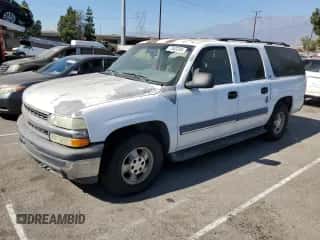 2002 Chevrolet Suburban LT z VIN 1GNEC16T52J256160, wystawiony jako Copart lot #77503294 z przebiegiem 246 338 mil mil oraz Czysty tytuł • Clean title. Historia ofert i sprzedaży dostępna na DreamBid. Obrazek 1.