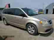 2013 Dodge Grand Caravan SE with VIN 2C4RDGBGXDR560909, listed as a Copart auction lot 80815605 with 161,874 mi miles and Salvage title. Bid and sale history available at DreamBid. Image 4.
