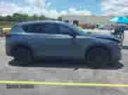 2023 Mazda CX-5 S Carbon Edition z VIN JM3KFBCM2P0200445, wystawiony jako IAAI lot #42745392 z przebiegiem 21 932 mil mil oraz . Historia ofert i sprzedaży dostępna na DreamBid. Obrazek 14.