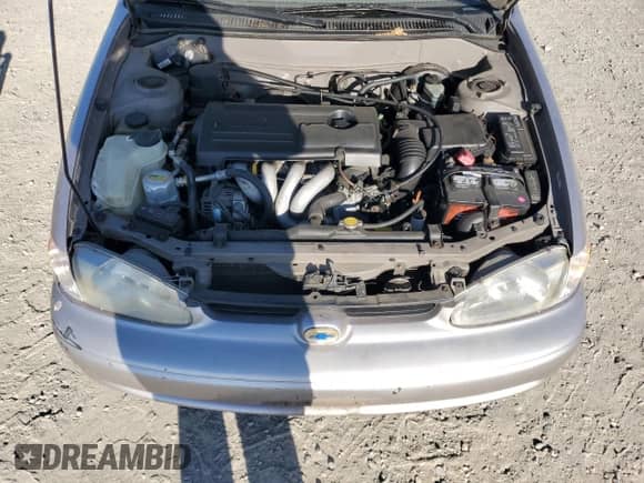 2000 Chevrolet Prizm with VIN 1Y1SK5485YZ407556, listed as a Copart auction lot 60894355 with 123,708 mi miles and Salvage title. Bid and sale history available at DreamBid. Image 11.