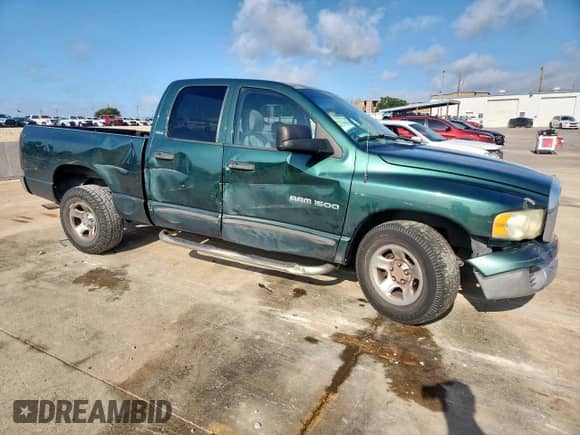 2002 Dodge 1500 with VIN 3B7HA18Z12G106142, listed as a Copart auction lot 61826335 with 221,059 mi miles and Salvage title. Bid and sale history available at DreamBid. Image 4.