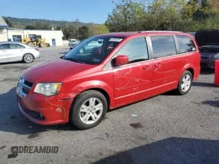 2012 Dodge Grand Caravan Crew with VIN 2C4RDGDG4CR404103, listed as a Copart auction lot 85336735 with 87,506 mi miles and Salvage title. Bid and sale history available at DreamBid. Image 1.