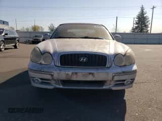 2003 Hyundai Sonata GLS z VIN KMHWF35H23A871372, wystawiony jako Copart lot #76199644 z przebiegiem 164 094 mil mil oraz Czysty tytuł • Clean title. Historia ofert i sprzedaży dostępna na DreamBid. Obrazek 5.