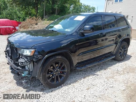 2017 Jeep Grand Cherokee Altitude with VIN 1C4RJFAGXHC864549, listed as a IAAI auction lot 42603675 with 151,648 mi miles and . Bid and sale history available at DreamBid. Image 18.