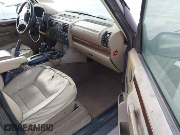 2002 Land Rover Discovery Cloth with VIN SALTY15412A766591, listed as a IAAI auction lot 42343334 with 162,431 mi miles and . Bid and sale history available at DreamBid. Image 5.