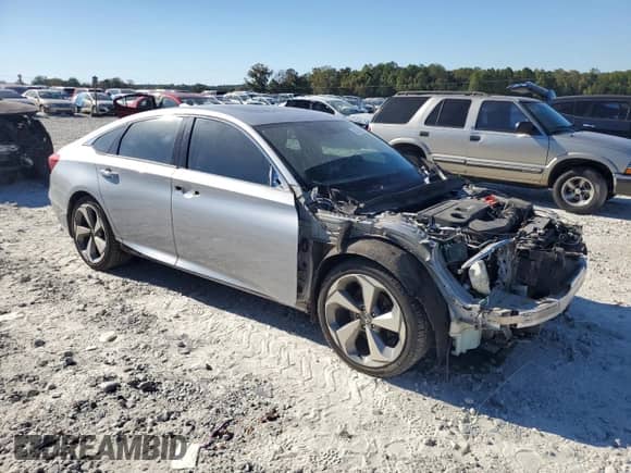 2018 Honda Accord Touring z VIN 1HGCV2F91JA006919, wystawiony jako Copart lot #82345515 z przebiegiem 128 886 mil mil oraz Szkoda całkowita • Salvage title. Historia ofert i sprzedaży dostępna na DreamBid. Obrazek 4.