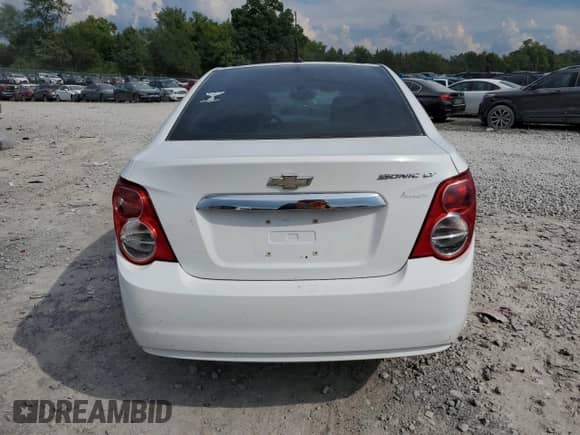 2013 Chevrolet Sonic LT with VIN 1G1JC5SH0D4172239, listed as a Copart auction lot 69065775 with 157,821 mi miles and Clean title. Bid and sale history available at DreamBid. Image 6.