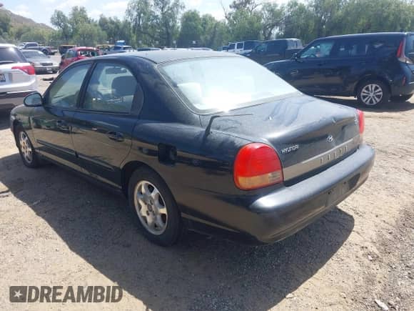 2001 Hyundai Sonata GLS z VIN KMHWF35V31A458928, wystawiony jako IAAI lot #41944264 z przebiegiem 118 398 mil mil oraz . Historia ofert i sprzedaży dostępna na DreamBid. Obrazek 3.