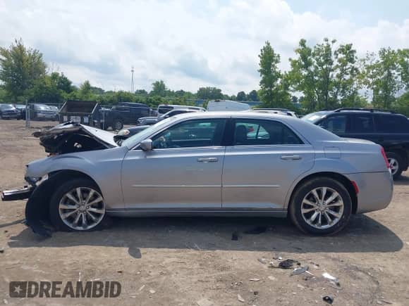 2015 Chrysler 300 Limited with VIN 2C3CCARG3FH923477, listed as a IAAI auction lot 42988981 with 48,095 mi miles and . Bid and sale history available at DreamBid. Image 15.