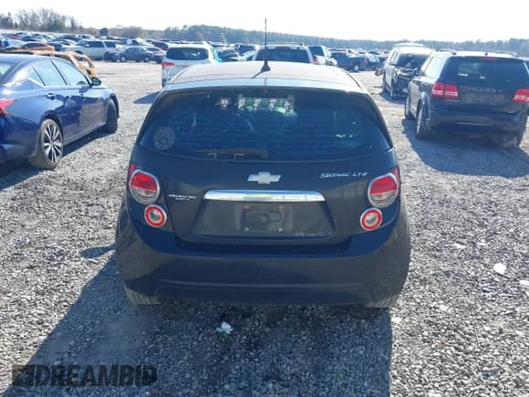 2013 Chevrolet Sonic LTZ with VIN 1G1JE6SH9D4100004, listed as a IAAI auction lot 41501606 with 122,973 mi miles and . Bid and sale history available at DreamBid. Image 16.