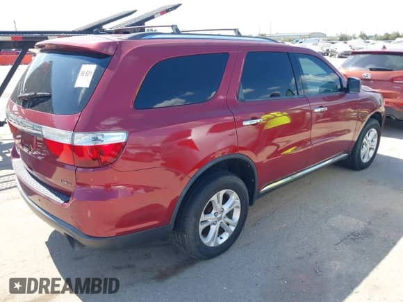 2013 Dodge Durango Crew with VIN 1C4SDJDT5DC565632, listed as a IAAI auction lot 43414719 with 130,151 mi miles and . Bid and sale history available at DreamBid. Image 4.
