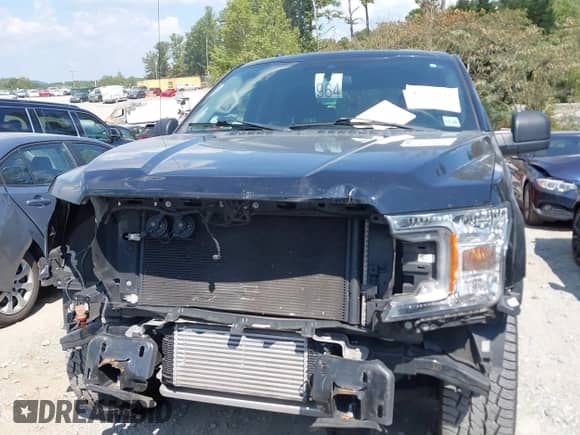 2019 Ford F-150 XLT with VIN 1FTEW1EPXKFD48372, listed as a IAAI auction lot 43235041 with 75,725 mi miles and . Bid and sale history available at DreamBid. Image 12.