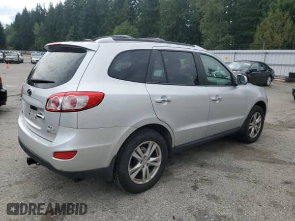 2012 Hyundai Santa Fe Limited with VIN 5XYZKDAG0CG153433, listed as a Copart auction lot 69701685 with 170,704 mi miles and Clean title. Bid and sale history available at DreamBid. Image 3.