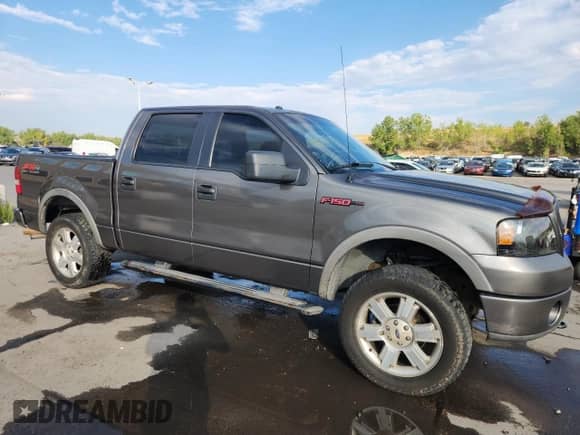 2006 Ford F-150 XLT with VIN 1FTPW14V66KD64056, listed as a Copart auction lot 71276435 with 175,362 mi miles and Salvage title. Bid and sale history available at DreamBid. Image 4.