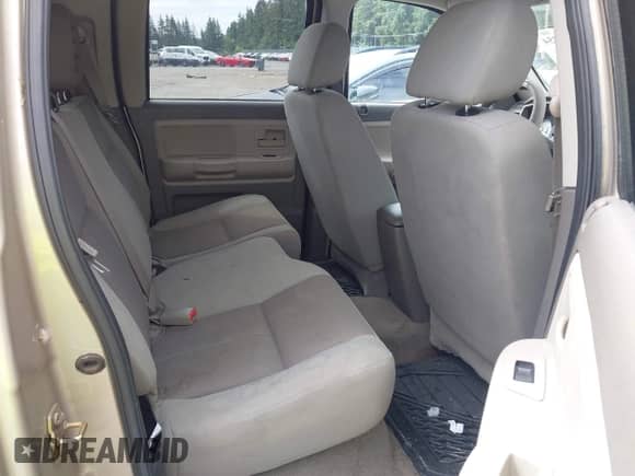 2005 Dodge Dakota SLT with VIN 1D7HE48N45S261788, listed as a IAAI auction lot 42709754 with 126,857 mi miles and . Bid and sale history available at DreamBid. Image 8.