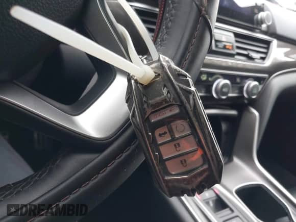 2022 Honda Accord Sport z VIN 1HGCV2F37NA019952, wystawiony jako IAAI lot #41581953 z przebiegiem 33 639 mil mil oraz . Historia ofert i sprzedaży dostępna na DreamBid. Obrazek 11.