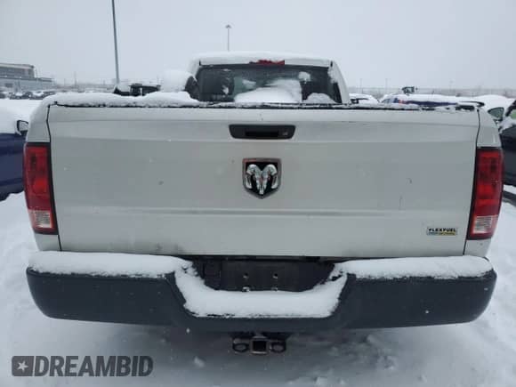 2012 Ram 1500 ST z VIN 3C6JD6DP2CG207886, wystawiony jako Copart lot #41557525 z przebiegiem 246 807 mil mil oraz Szkoda całkowita • Salvage title. Historia ofert i sprzedaży dostępna na DreamBid. Obrazek 6.