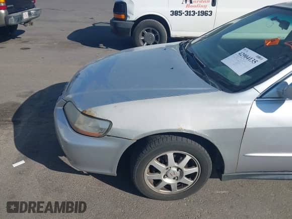 2002 Honda Accord SE z VIN 1HGCG668X2A059712, wystawiony jako IAAI lot #42904135 z przebiegiem Nie podano mil oraz . Historia ofert i sprzedaży dostępna na DreamBid. Obrazek 6.