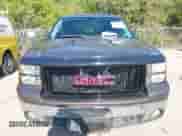 2007 GMC Sierra 1500 SLE2 z VIN 2GTEC13J171582910, wystawiony jako IAAI lot #43389506 z przebiegiem 176 962 mil mil oraz . Historia ofert i sprzedaży dostępna na DreamBid. Obrazek 12.