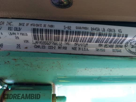 2002 Jeep Wrangler Sahara with VIN 1J4FA59S62P768112, listed as a IAAI auction lot 42657738 with 196,571 mi miles and . Bid and sale history available at DreamBid. Image 9.