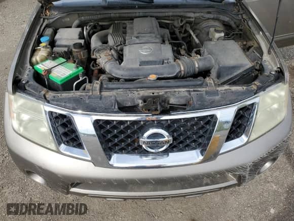 2008 Nissan Pathfinder SE z VIN 5N1AR18B38C605996, wystawiony jako Copart lot #57126655 z przebiegiem 413 908 mil mil oraz Szkoda całkowita • Salvage title. Historia ofert i sprzedaży dostępna na DreamBid. Obrazek 12.