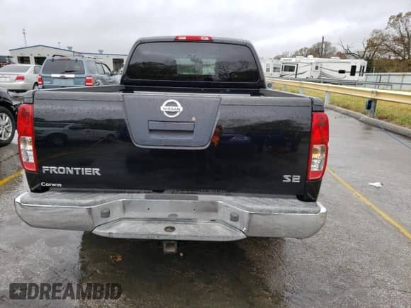 2009 Nissan Frontier LE z VIN 1N6AD09U69C402936, wystawiony jako Copart lot #78945954 z przebiegiem 223 318 mil mil oraz Szkoda całkowita • Salvage title. Historia ofert i sprzedaży dostępna na DreamBid. Obrazek 6.