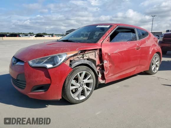 2016 Hyundai Veloster with VIN KMHTC6AD4GU284031, listed as a Copart auction lot 82049985 with 127,545 mi miles and Salvage title. Bid and sale history available at DreamBid. Image 1.