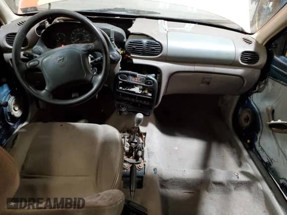 1997 Hyundai Accent z VIN KMHVD14NXVU221266, wystawiony jako Copart lot #86383044 z przebiegiem 159 517 mil mil oraz Szkoda całkowita • Salvage title. Historia ofert i sprzedaży dostępna na DreamBid. Obrazek 8.