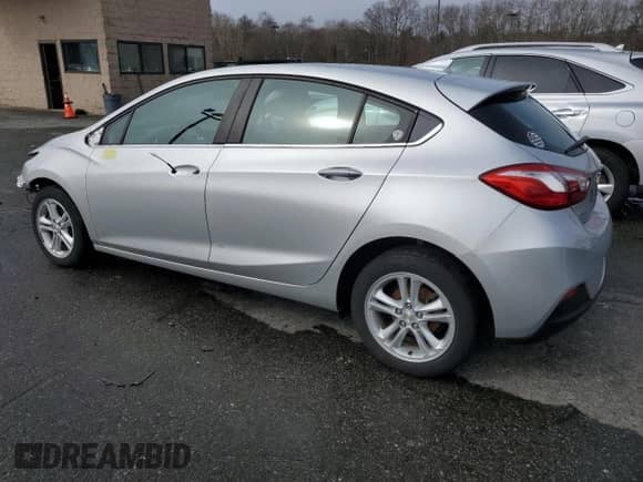 2018 Chevrolet Cruze LT with VIN 3G1BH6SE7JS647723, listed as a Copart auction lot 47550144 with 124,849 mi miles and . Bid and sale history available at DreamBid. Image 2.