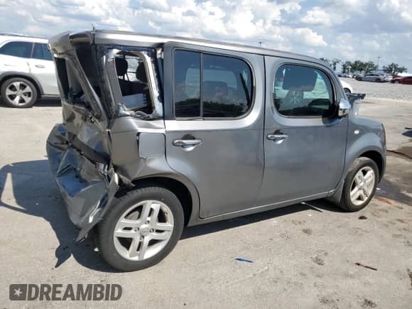 2012 Nissan Cube SL with VIN JN8AZ2KR0CT255062, listed as a Copart auction lot 58549275 with 130,369 mi miles and Salvage title. Bid and sale history available at DreamBid. Image 3.