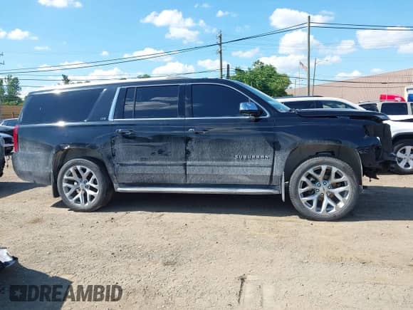 2015 Chevrolet Suburban LTZ с VIN 1GNSKKKCXFR566832, выставлен на аукционе IAAI как лот 42636753 с пробегом 222 368 миль миль и . История ставок и продаж доступна на DreamBid. Изображение 13.