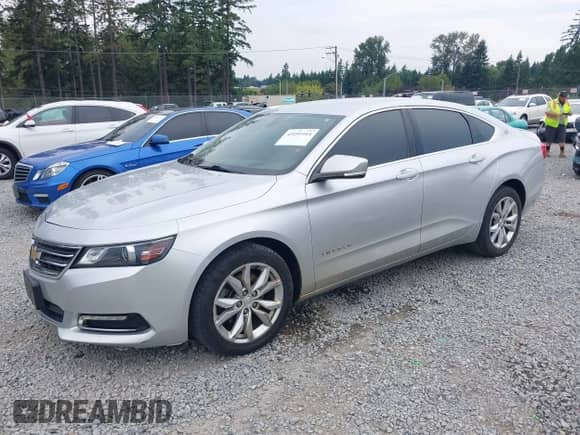 2018 Chevrolet Impala LT with VIN 2G1105S37J9116885, listed as a IAAI auction lot 43101164 with 104,553 mi miles and . Bid and sale history available at DreamBid. Image 2.