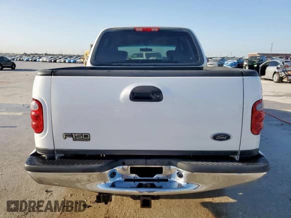 2002 Ford F-150 XLT с VIN 1FTRW08692KD89789, выставлен на аукционе Copart как лот 52621555 с пробегом 150 012 миль миль и Списание • Salvage title. История ставок и продаж доступна на DreamBid. Изображение 6.