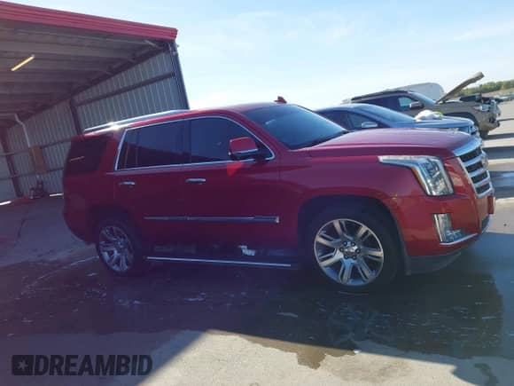 2015 Cadillac Escalade Premium z VIN 1GYS4NKJ2FR506654, wystawiony jako IAAI lot #43468358 z przebiegiem 147 676 mil mil oraz . Historia ofert i sprzedaży dostępna na DreamBid. Obrazek 13.