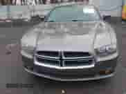 2012 Dodge Charger SE with VIN 2C3CDXBG9CH286987, listed as a IAAI auction lot 38808209 with 121,026 mi miles and . Bid and sale history available at DreamBid. Image 6.