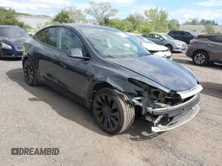 2022 Tesla Model Y Performance with VIN 7SAYGDEF1NF400549, listed as a IAAI auction lot 43042707 with 58,529 mi miles and . Bid and sale history available at DreamBid. Image 1.
