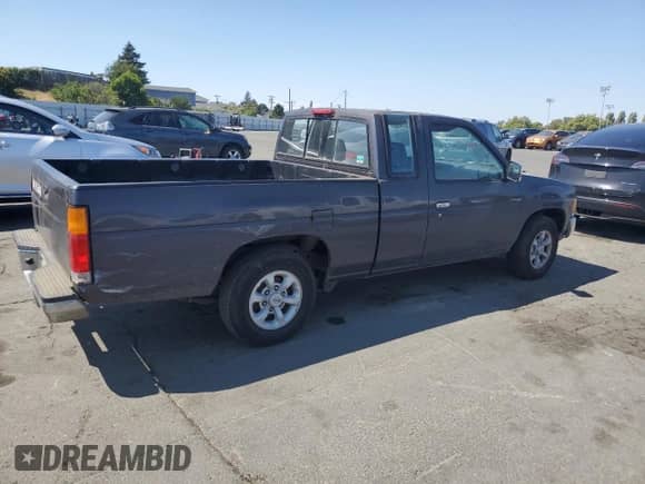 1997 Nissan Frontier XE with VIN 1N6SD16S3VC406983, listed as a Copart auction lot 60074865 with 209,171 mi miles and Clean title. Bid and sale history available at DreamBid. Image 3.