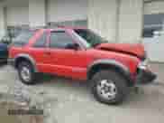 2001 Chevrolet Blazer LS z VIN 1GNCT18W71K247094, wystawiony jako Copart lot #53748065 z przebiegiem 145 695 mil mil oraz Szkoda całkowita • Salvage title. Historia ofert i sprzedaży dostępna na DreamBid. Obrazek 4.