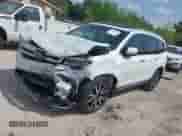 2022 Honda Pilot Touring 7-Passenger z VIN 5FNYF5H67NB027356, wystawiony jako IAAI lot #42080323 z przebiegiem 56 826 mil mil oraz . Historia ofert i sprzedaży dostępna na DreamBid. Obrazek 2.