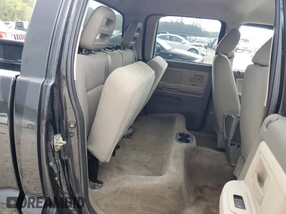 2007 Dodge Dakota SLT z VIN 1D7HE48P37S206527, wystawiony jako Copart lot #80980784 z przebiegiem Nie podano mil oraz Nie do naprawy • Non repairable. Historia ofert i sprzedaży dostępna na DreamBid. Obrazek 10.